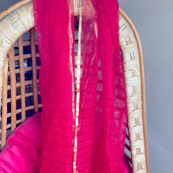 Red solid duppata with golden tasselled border - Picture 4 of 5